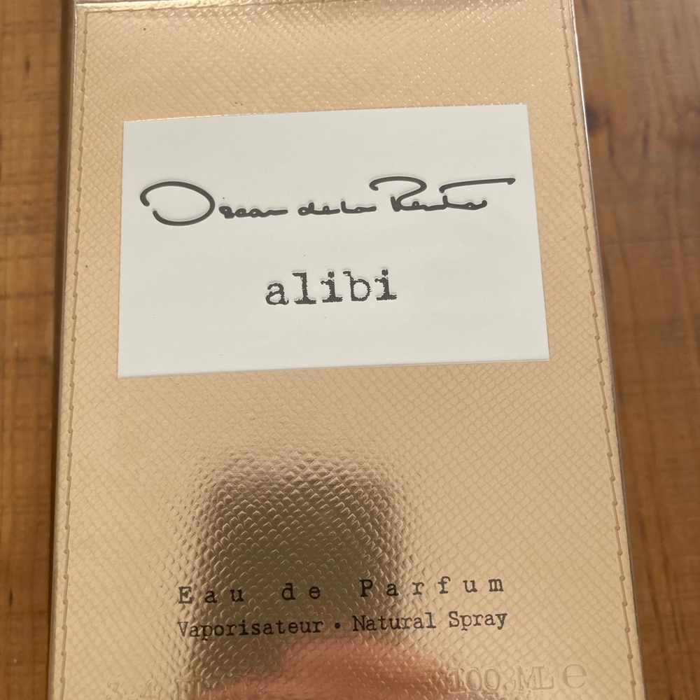Oscar De La Renta Alibi Perfume